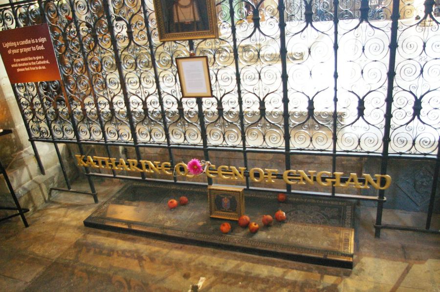 The grave of Katharine of Aragon in Peterborough Cathedral, with pomegranates laid on the slab